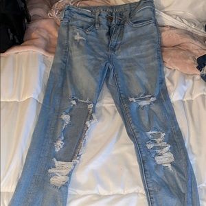 American Eagle distressed light skinny jeans